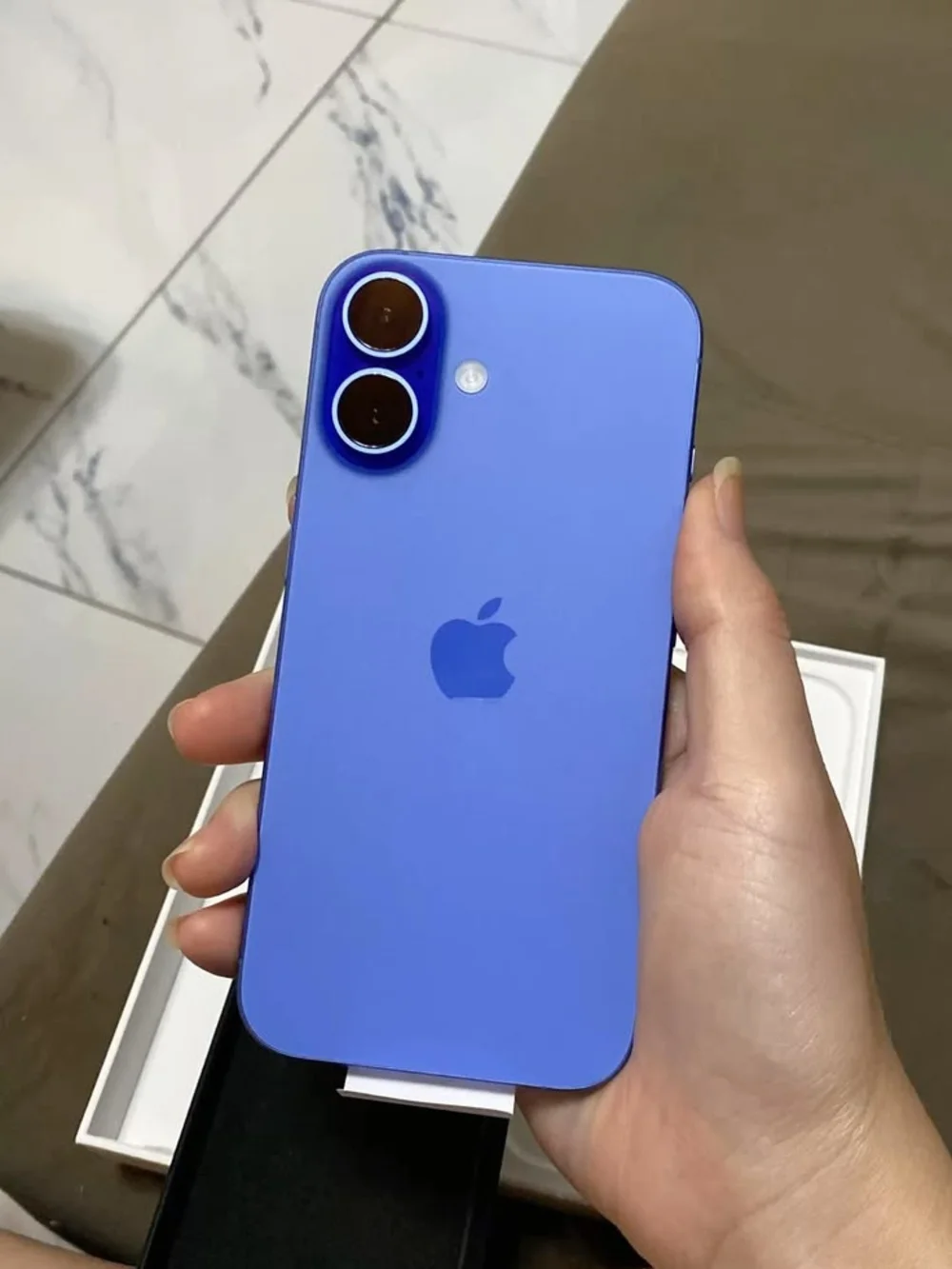 Apple Blue iPhone with Clear Protective Case